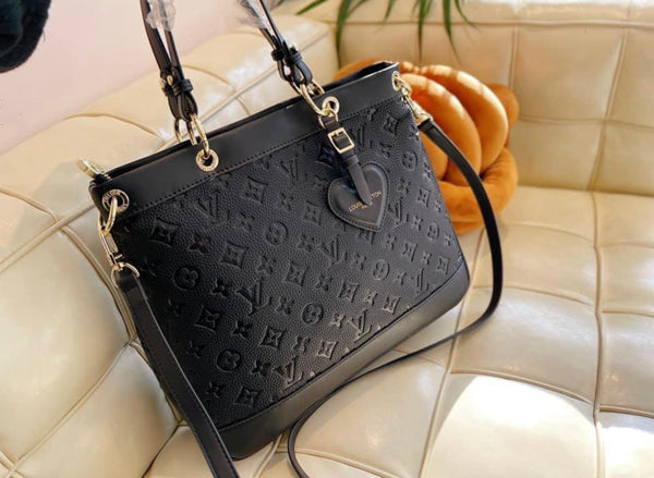 Black embossed purse