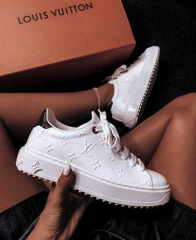 White embossed sneakers